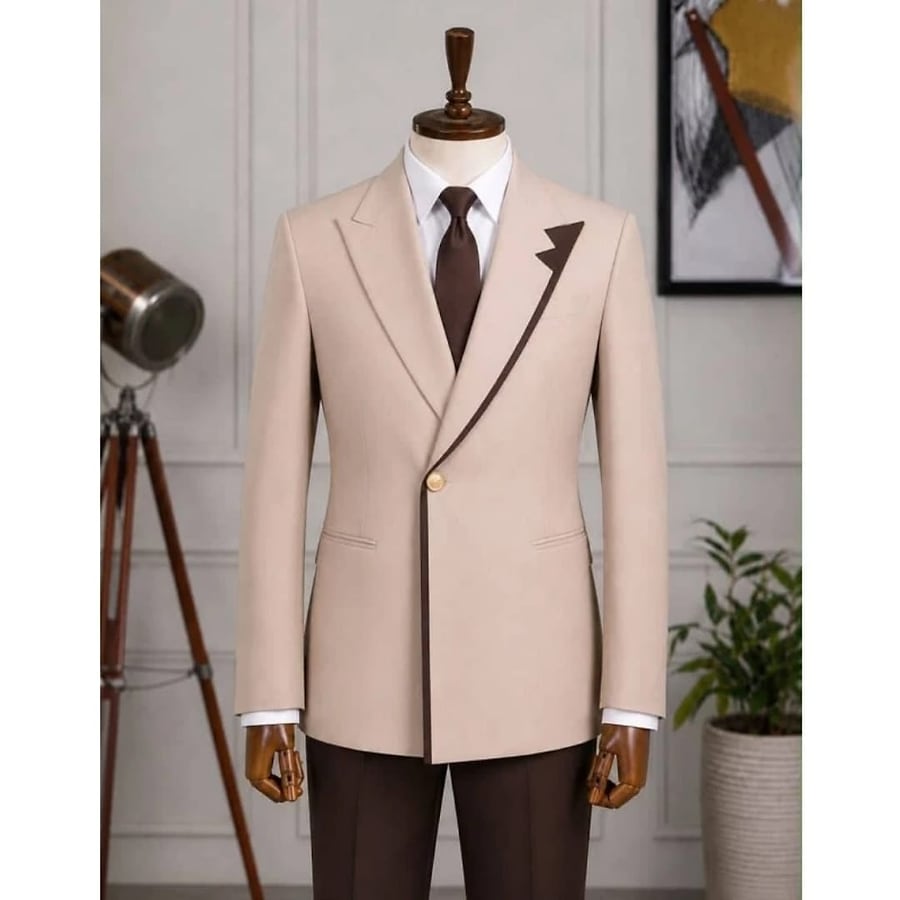 Beige Double-Breasted Suit: peak lapel with brown contrast piping, worn with brown trousers