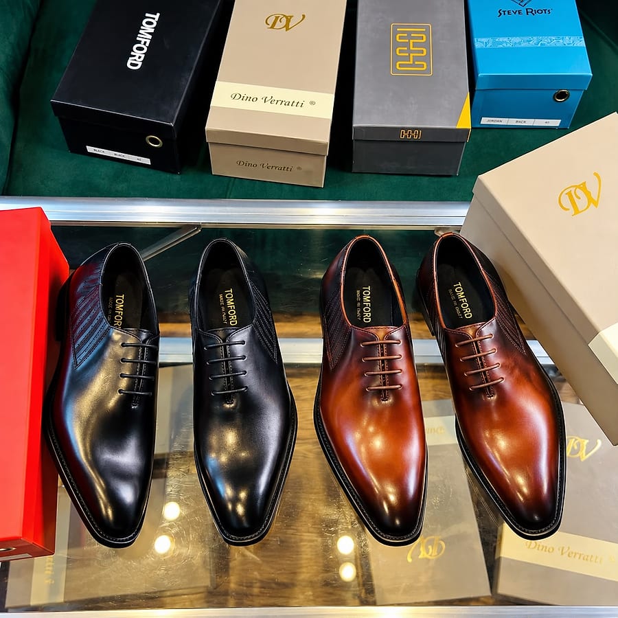 Black and brown whole-cut leather oxfords